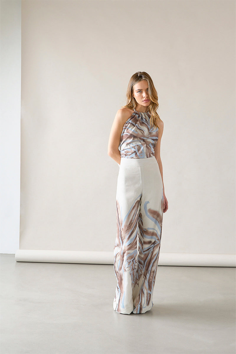 Tinta Latina Solei pants in ivory print, stylish and comfortable women's pants with vibrant pattern and relaxed fit.