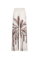 Tinta Latina Solei pants in ivory print, stylish wide-leg trousers with a vibrant floral pattern, perfect for casual or dressy wear.