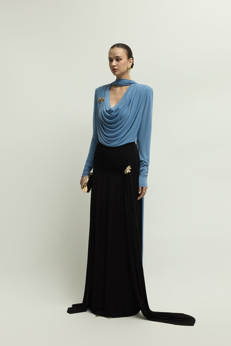 Blue SONIQ top by Jenny K Tran, featuring a stylish design, shown on a model with a fitted silhouette and modern neckline.