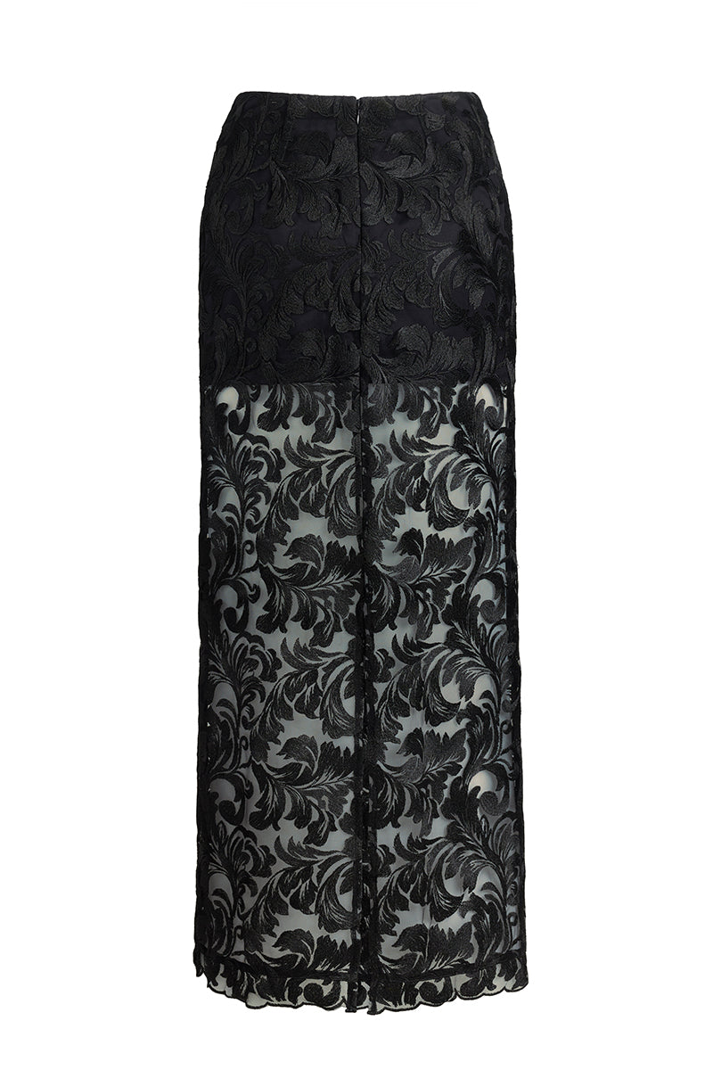 Black Scarlett Gasque Sovereign Skirt, a flowing maxi skirt with a ghost back design, styled for elegant and casual looks.