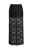 Black Scarlett Gasque Sovereign Maxi Skirt with ghostly back design, flowing fabric, and elegant style for women's fashion.