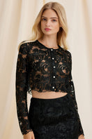 Black Sovereign top by Scarlett Gasque, front view showing fitted design and stylish neckline.