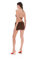 Brown mini beach skirt from Selia Richwood's LIA cover-ups collection, featuring a stylish, lightweight design perfect for beachwear.