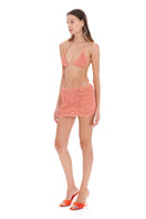 Selia Richwood LIA Peach mini beach skirt cover-up with lightweight fabric and stylish design, perfect for casual beachwear.