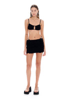 Selia Richwood LIA black mini beach skirt cover-up, lightweight fabric, tied waist, perfect for beach or poolside wear.