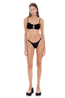 Black Selia Richwood LIA bikini top with adjustable straps and a sleek design, displayed on a neutral background.