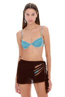 Selia Richwood Lily Skirt cover-up featuring lightweight fabric and floral pattern, perfect for beach or poolside wear.