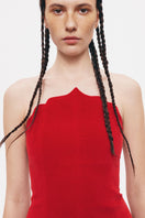 Red Saray dress by PODYH, a stylish midi dress with elegant design, perfect for fashionable occasions.