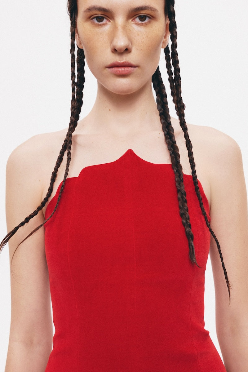 Red Saray dress by PODYH, a stylish midi dress with elegant design, perfect for fashionable occasions.