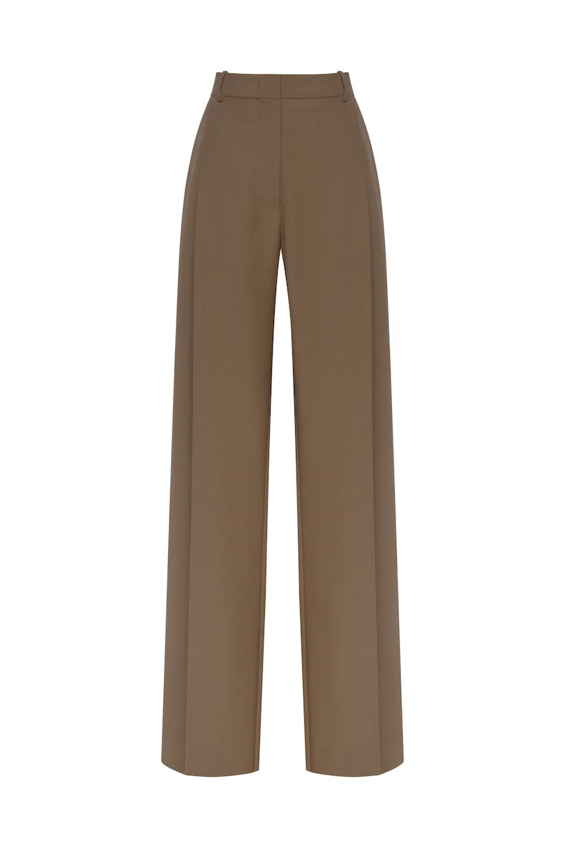 Beige PODYH KEMER pants shown on a model, featuring a relaxed fit and stylish design for casual or everyday wear.