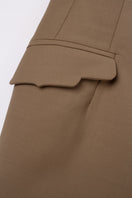 PODYH Kemer beige jacket, stylish outerwear with a tailored fit, shown on a hanger against a neutral background.