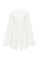 PODYH white GUL cape coat shown on a model, stylish outerwear with a relaxed fit and elegant design for cold weather.