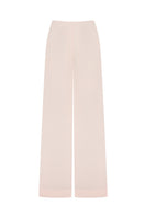 Pink Minaret pants by Podyh, featuring a stylish and comfortable design, shown on a model with relaxed fit and vibrant color.
