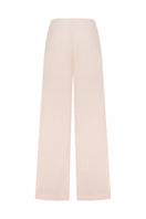 Pink Minaret pants by Podyh featuring a relaxed fit and stylish design, shown on a model.