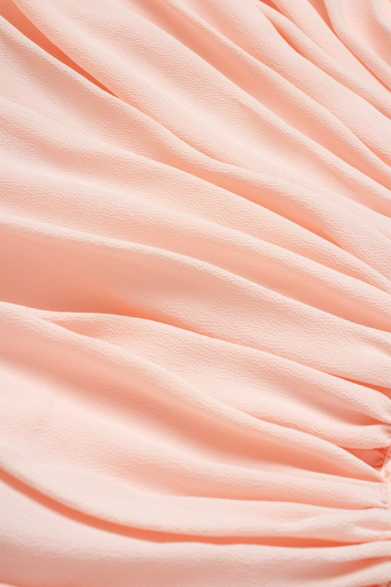 Pink Minaret pants by PODYH featuring a relaxed fit and stylish design, shown in this image.