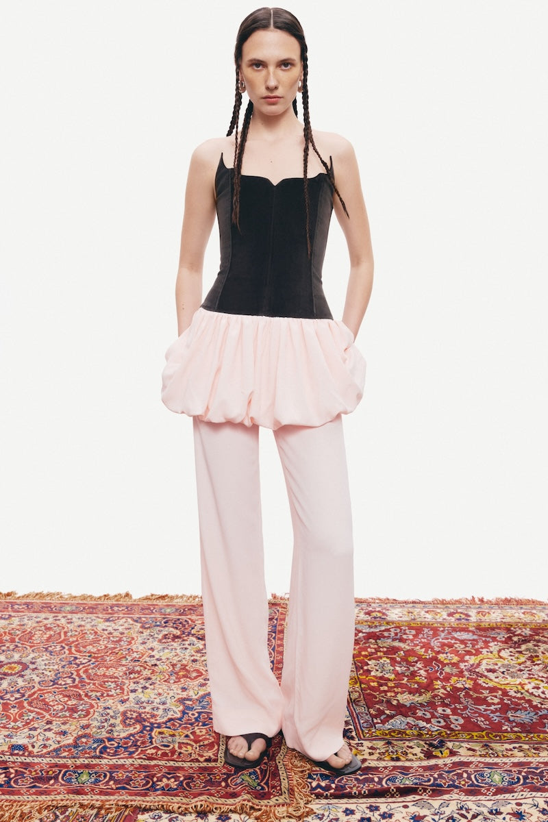 Pink Minaret pants by Podyh, featuring a relaxed fit with a stylish design, displayed on a neutral background.