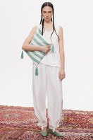 White Shalvar pants by PODYH, casual traditional-style pants with a comfortable fit, shown in the image.