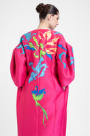 Hand-painted pink bush coat by Tiny Ink, featuring abstract floral design on a stylish coat.