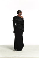 Sean Sheila black deconstructed top with back opening, stylish sleeveless design, shown from the back view.