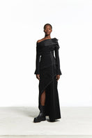 Sean Sheila black deconstructed top with back opening, stylish sleeveless design perfect for modern fashion looks.