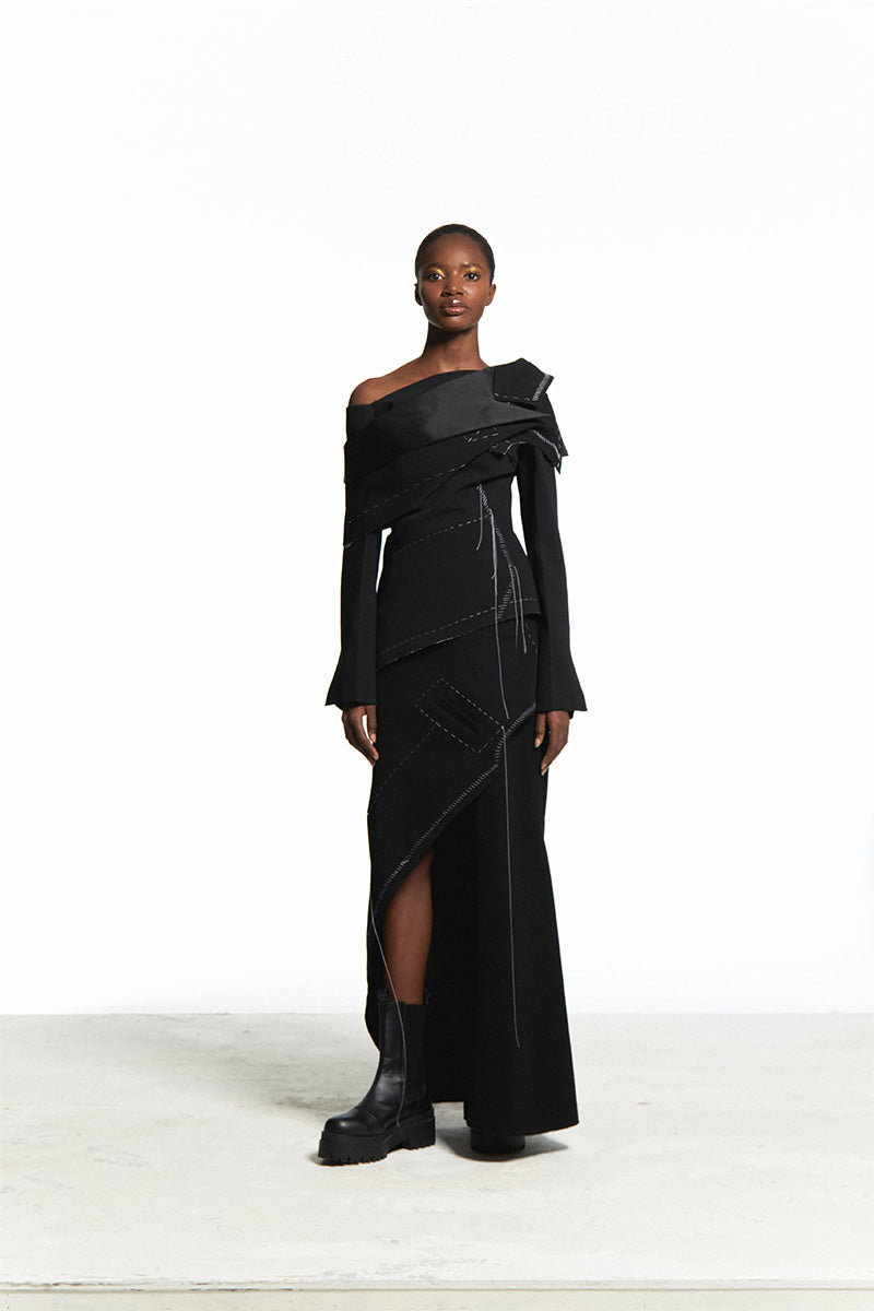 Sean Sheila black deconstructed top with back opening, stylish sleeveless design perfect for modern fashion looks.