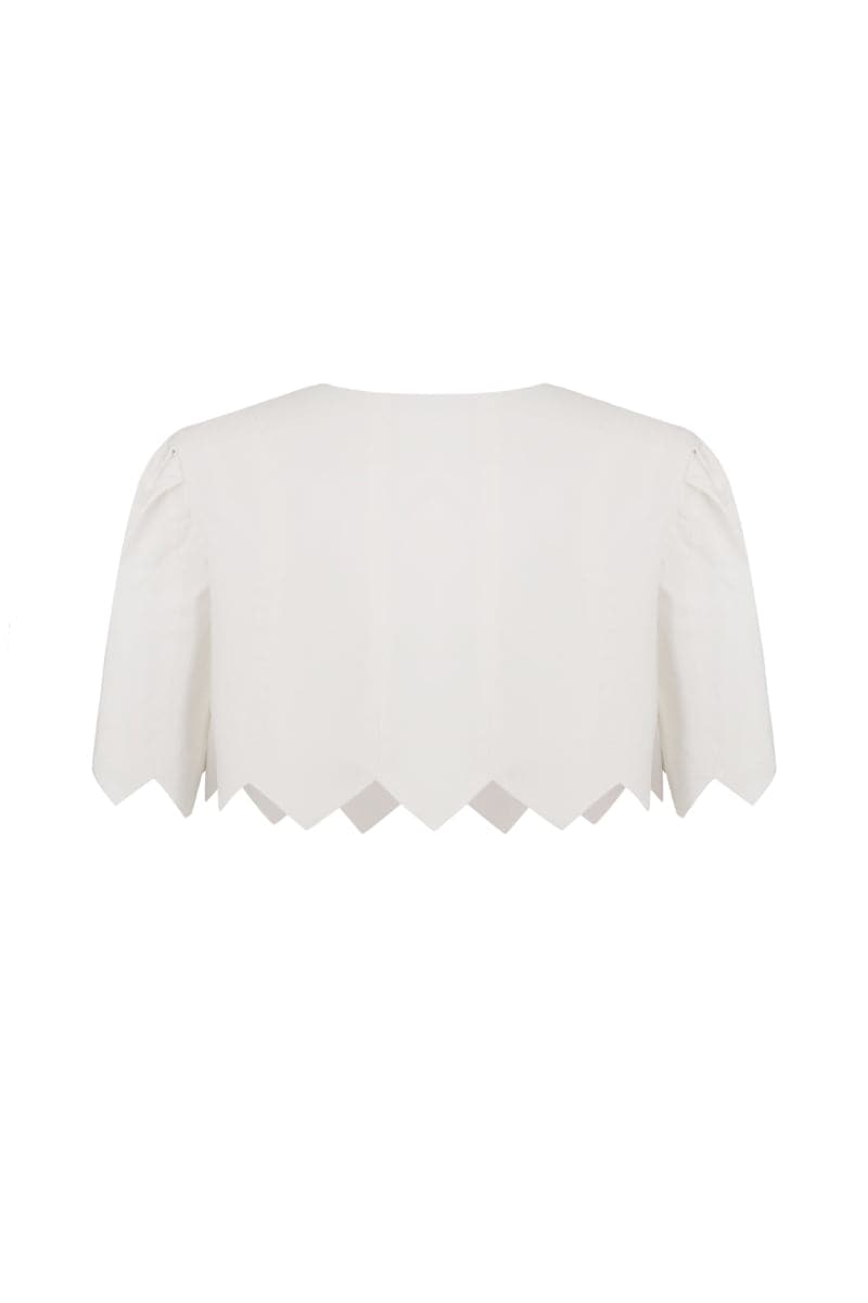 White crop top from PODYH's DZVINYTSYA collection, featuring a stylish and trendy design perfect for casual wear.