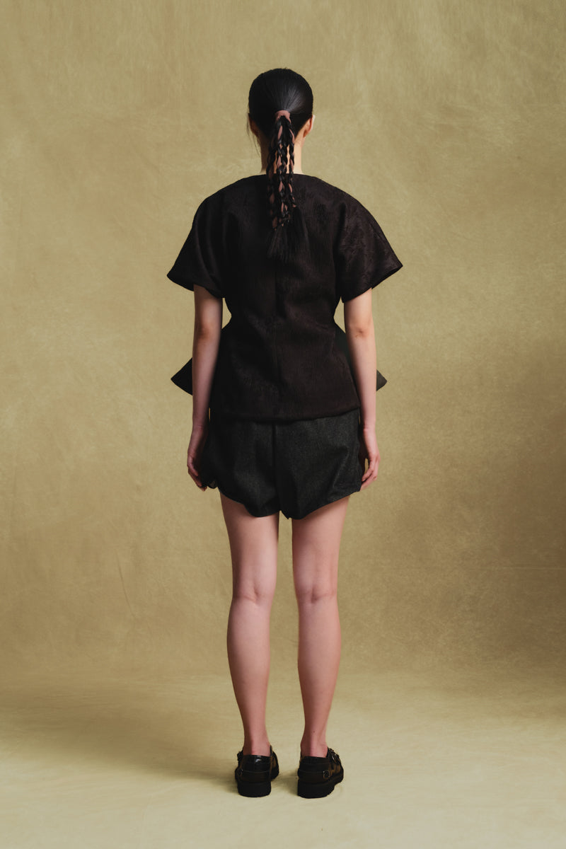 Sean Sheila black embroidery kimono top with intricate embroidery, featuring flowing fabric and wide sleeves, shown from the back.