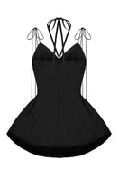 Black balloon hem top by Sean Sheila, showcasing a relaxed fit with balloon-style sleeves and a stylish hem detail.