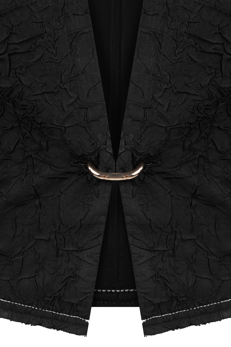Black crinkled cropped jacket by Sean Sheila, shown in detail with textured fabric and stylish design.
