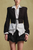 Black crinkled cropped jacket by Sean Sheila, shown in detail with textured fabric and stylish fit.