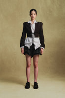 Black crinkled cropped jacket by Sean Sheila, stylish lightweight jacket with textured fabric, front view.