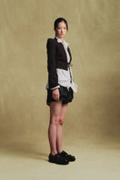 Side view of Sean Sheila black cropped crinkled jacket, showcasing its textured fabric and stylish fit.
