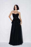 Lili Blanc sweetheart neckline black gown with elegant design, showcased on a model for formal evening wear.