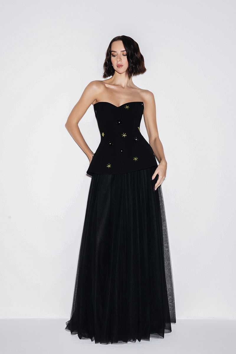 Lili Blanc sweetheart neckline black gown with elegant design, showcased on a model for formal evening wear.