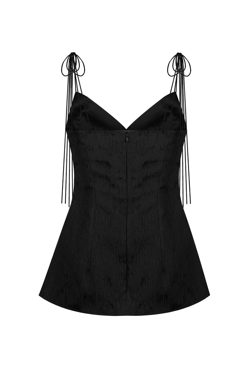 Black jacquard camisole top by Sean Sheila, shown from the back with intricate woven pattern and sleeveless design.