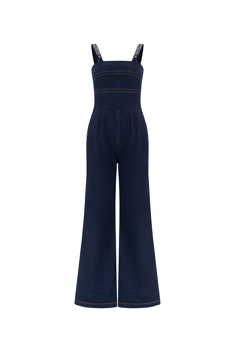Blue denim jumpsuit by Lili Blanc with crystal embellishments, featuring a front view and stylish design details.