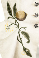 White Jacquard tank top from Sean Sheila featuring intricate woven patterns and a sleeveless design.