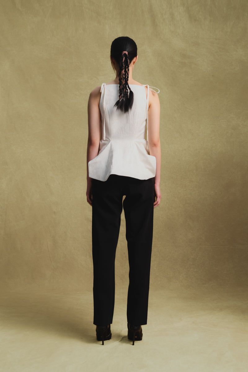 White jacquard tank top by Sean Sheila, showing the back view with intricate woven pattern and sleeveless design.