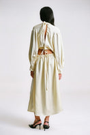 Sean Sheila cut-out maxi dress with piercing details, showcasing a stylish back design and elegant silhouette.