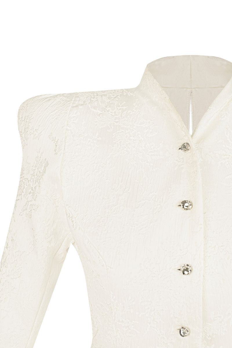 Sean Sheila BESKAP jacket with flared hems, featuring a stylish design and tailored fit, shown in a detailed product image.