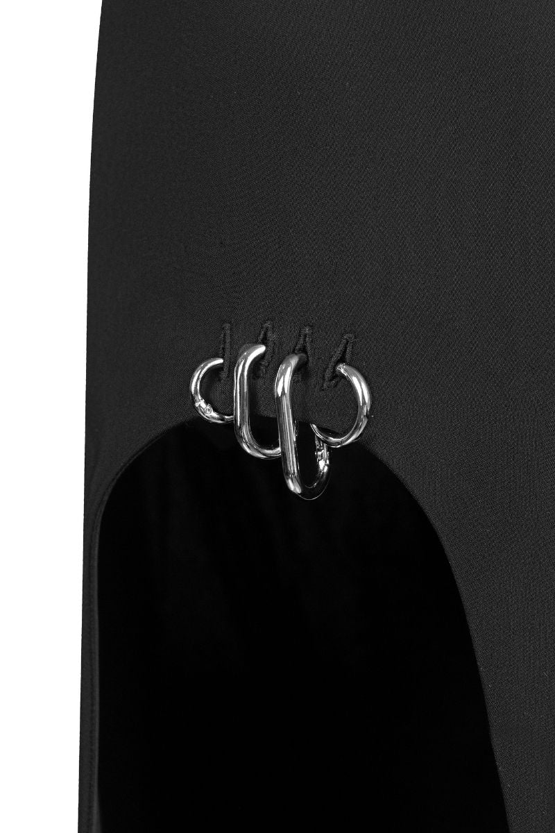 Black Sean Sheila maxi skirt with cut-out slit and piercing details, showcasing a stylish and modern design.