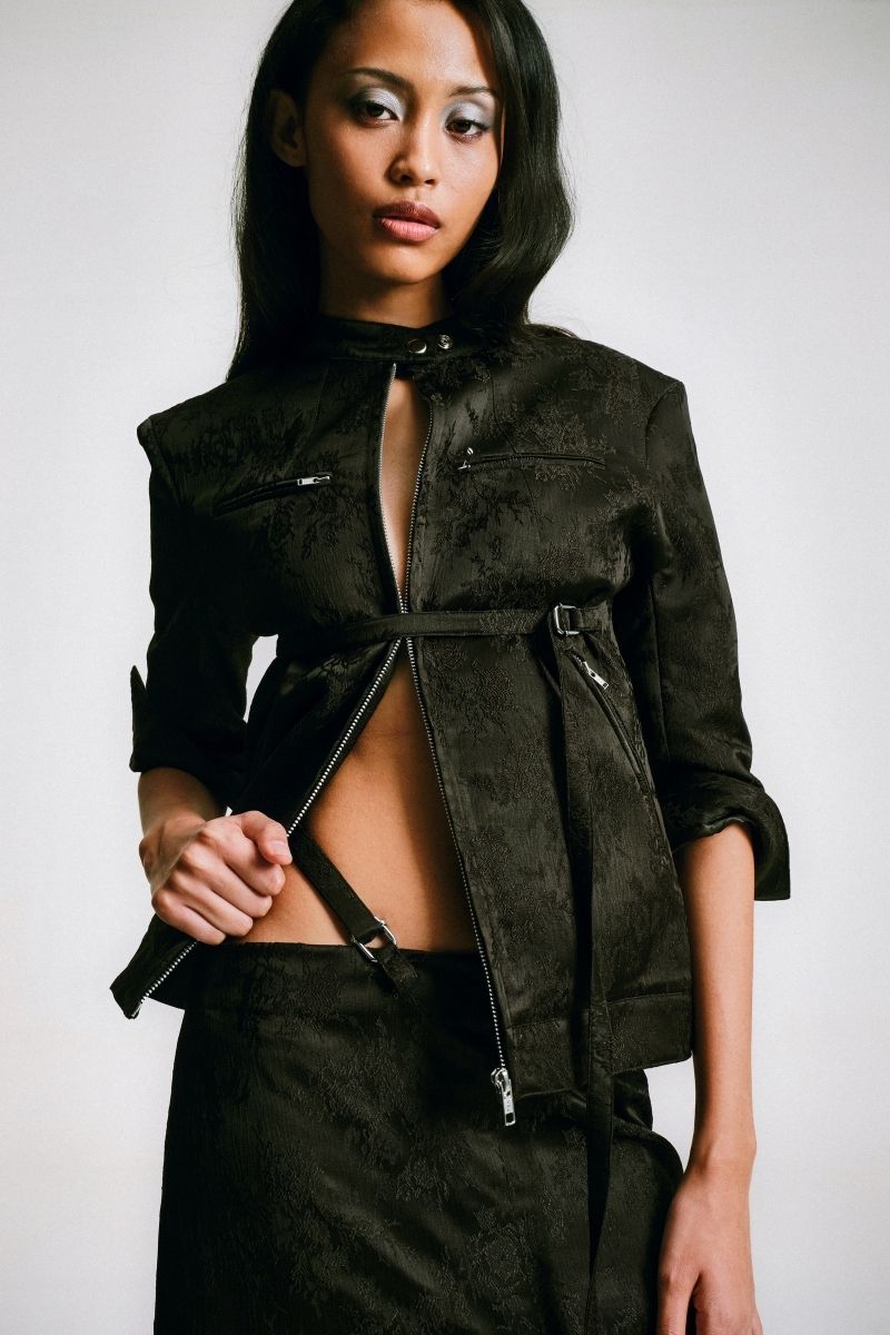 Sean Sheila cropped mandarin motorcycle jacket in vibrant orange with zipper details and stylish collar.