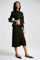 Sean Sheila cropped mandarin motorcycle jacket shown from side view, featuring stylish design and tailored fit.