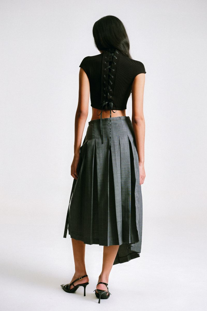 Back view of Sean Sheila cropped corset top, showcasing fitted design and back detailing, styled as a trendy women's top.