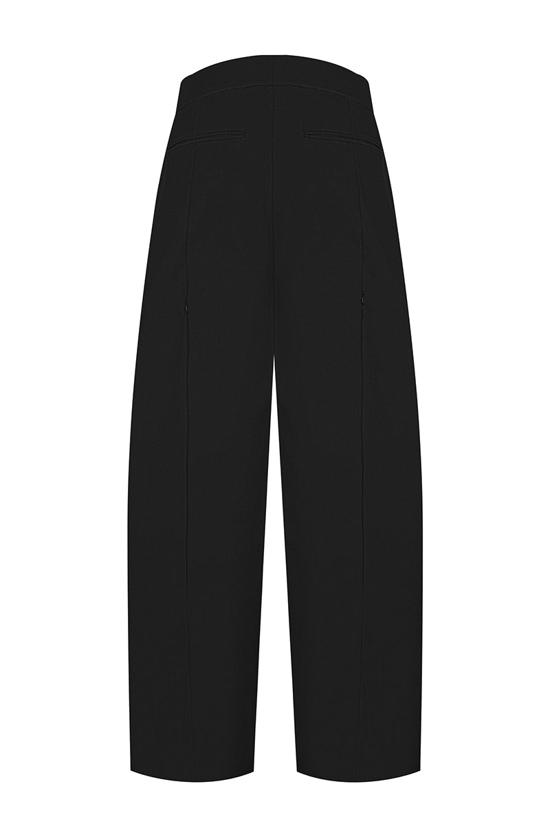 Sean Sheila cowboy pants shown from the back, featuring classic Western stitching and durable denim fabric.