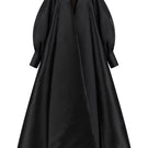 Lili Blanc fluid longline overcoat in a sleek, lightweight fabric, shown from the front with a classic collar and tailored fit.