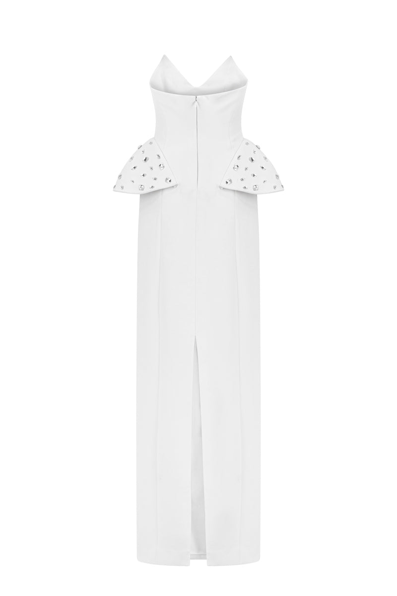 Lili Blanc strapless structured gown shown from the back with fitted bodice and flowing skirt, elegant evening wear design.