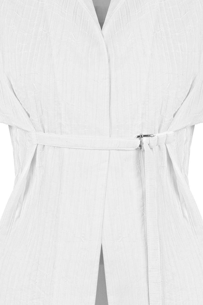 Sean Sheila tailored shirt with belt opening, featuring a sleek design and detailed stitching.