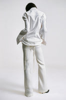 Sean Sheila tailored shirt with belt opening, shown from the back, featuring a sleek design and modern style.