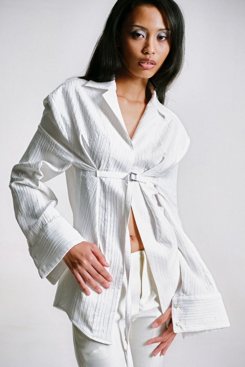 Sean Sheila tailored shirt with belt opening, featuring a sleek design and detailed stitching, ideal for stylish casual or formal wear.